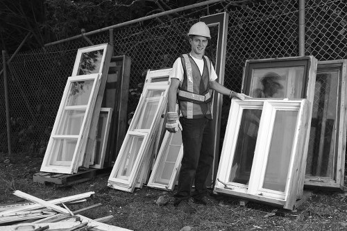 Clearing out old furniture in a modern Canary Wharf apartment