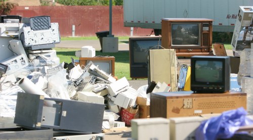 Professional technician assessing loft clearance needs